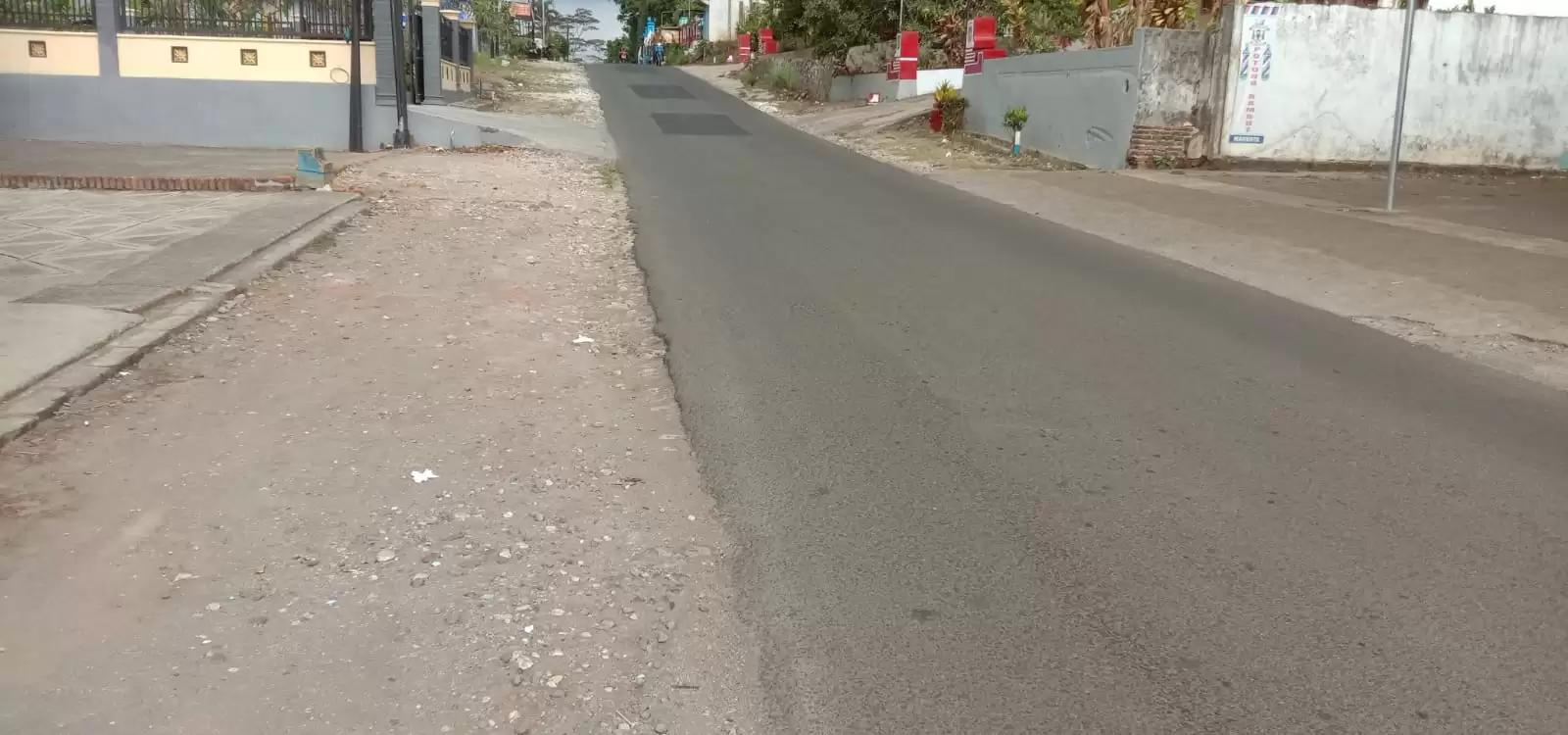 Jelang Akhir Tahun, DPUBM Kabupaten Malang Realisasikan Pengaspalan Jalan di Desa Harjokuncaran
