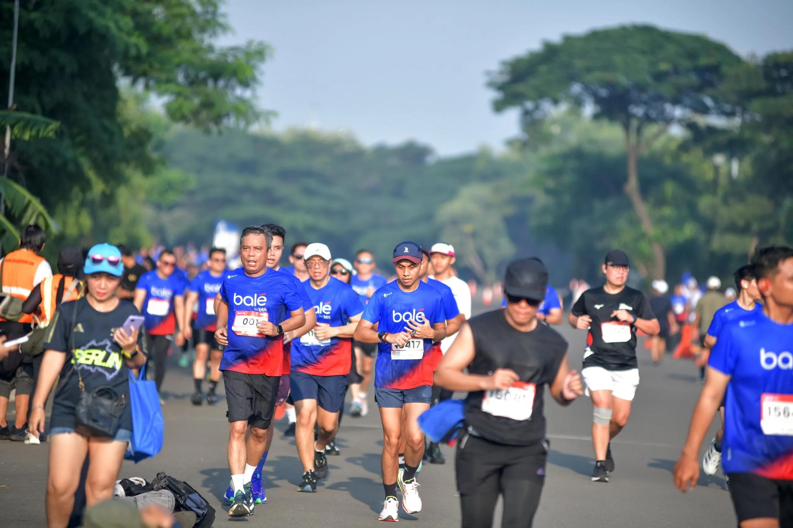 PT Bank Tabungan Negara (Persero) Tbk (BTN) menggelar BTN Run 2026 for Charity di Ancol dengan skema donasi berbasis partisipasi dan jarak tempuh. Setiap peserta yang finis dikonversi menjadi Rp76.000 dan setiap kilometer menjadi Rp7.600. Total donasi yang terkumpul mencapai Rp760 juta, yang akan disalurkan untuk sektor keagamaan, lingkungan, dan sosial. (Foto: Dok MI/BTN)