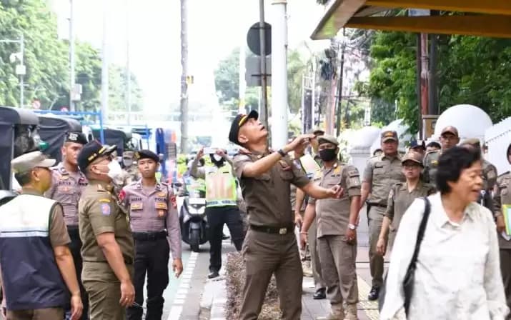 Satpol PP DKI Jaring 961 Pelanggar Perda Parkir Liar Hingga PPKS