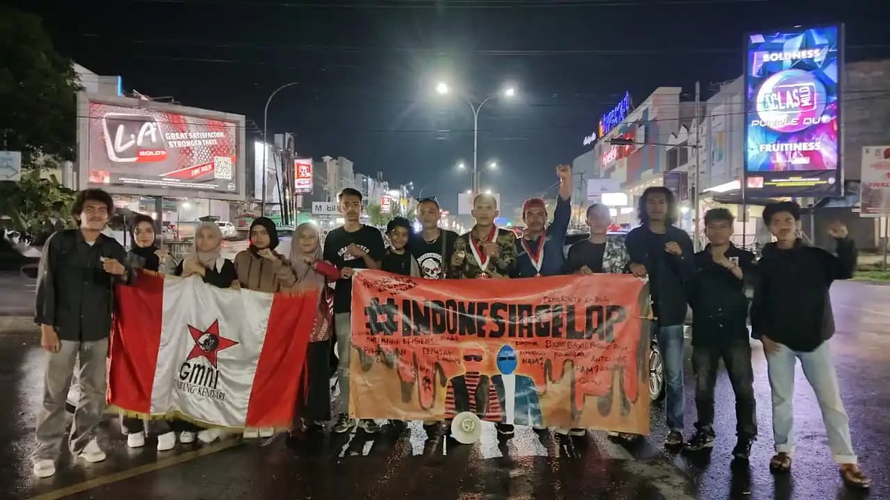 Di tengah Hujan, GMNI Kendari Gelar Aksi, Respons Kebijakan Pemerintah Pusat