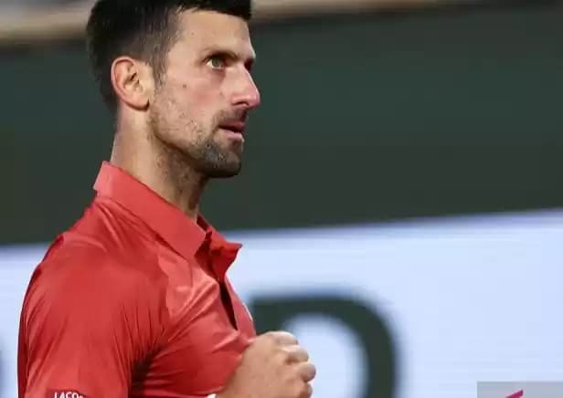 Foto Petenis Serbia Novak Djokovic bereaksi