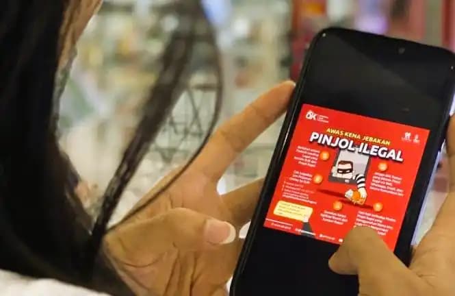 Ilustrasi peringatan dari OJK untuk mewaspadai jebakan pinjaman online ilegal
