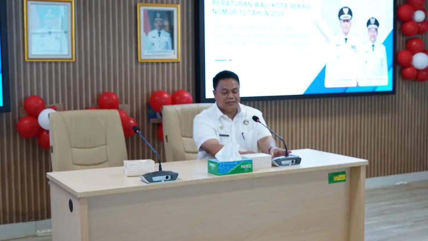 Kepala Diskominfotandi, Robet TP Siagian